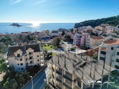 Urbanized plot with an unfinished residential building in Petrovac